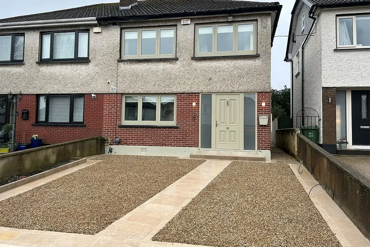 Completed gravel driveway with natural stone framing at Monalea Grove Firhouse Dublin
