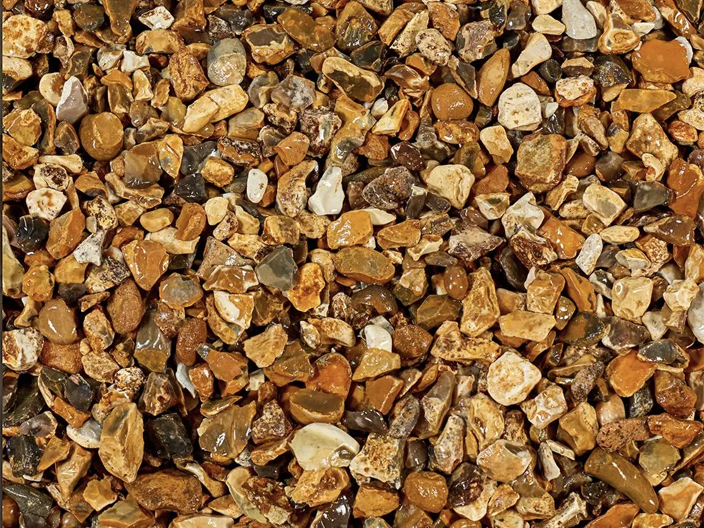 Golden gravel showing warm gold, cream and brown tones