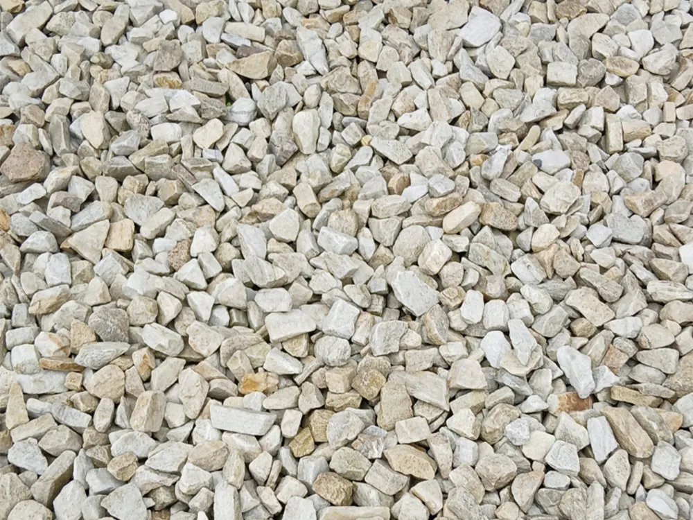 Quartz gravel showing a blend of cream, gold and grey tones