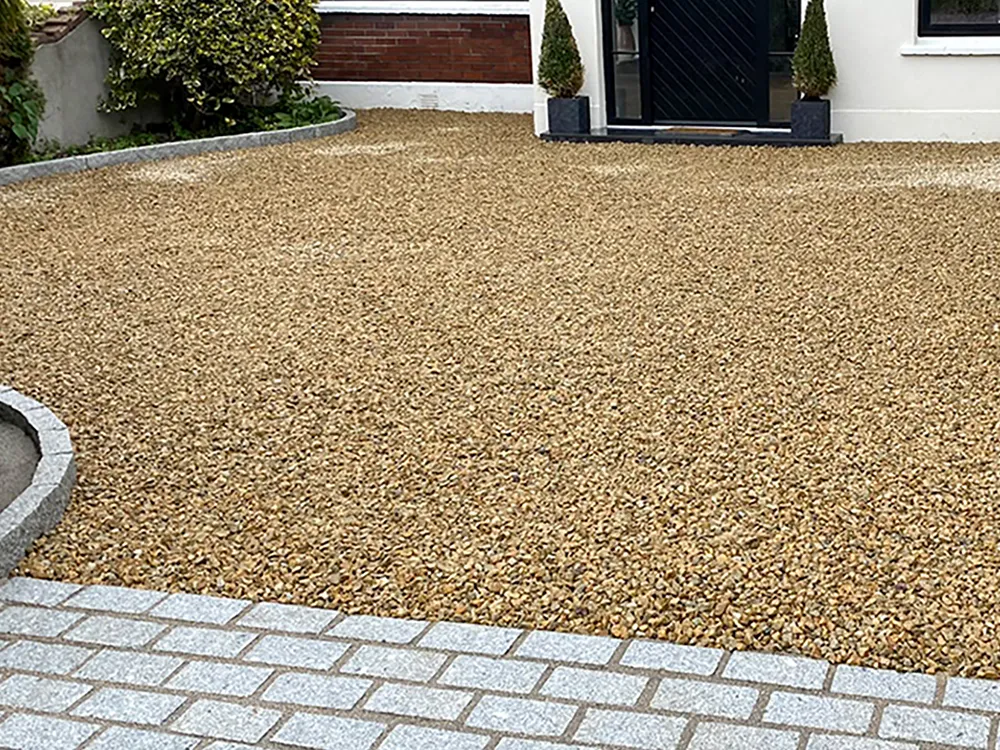 Close-up of the natural stone finish on a gravel driveway