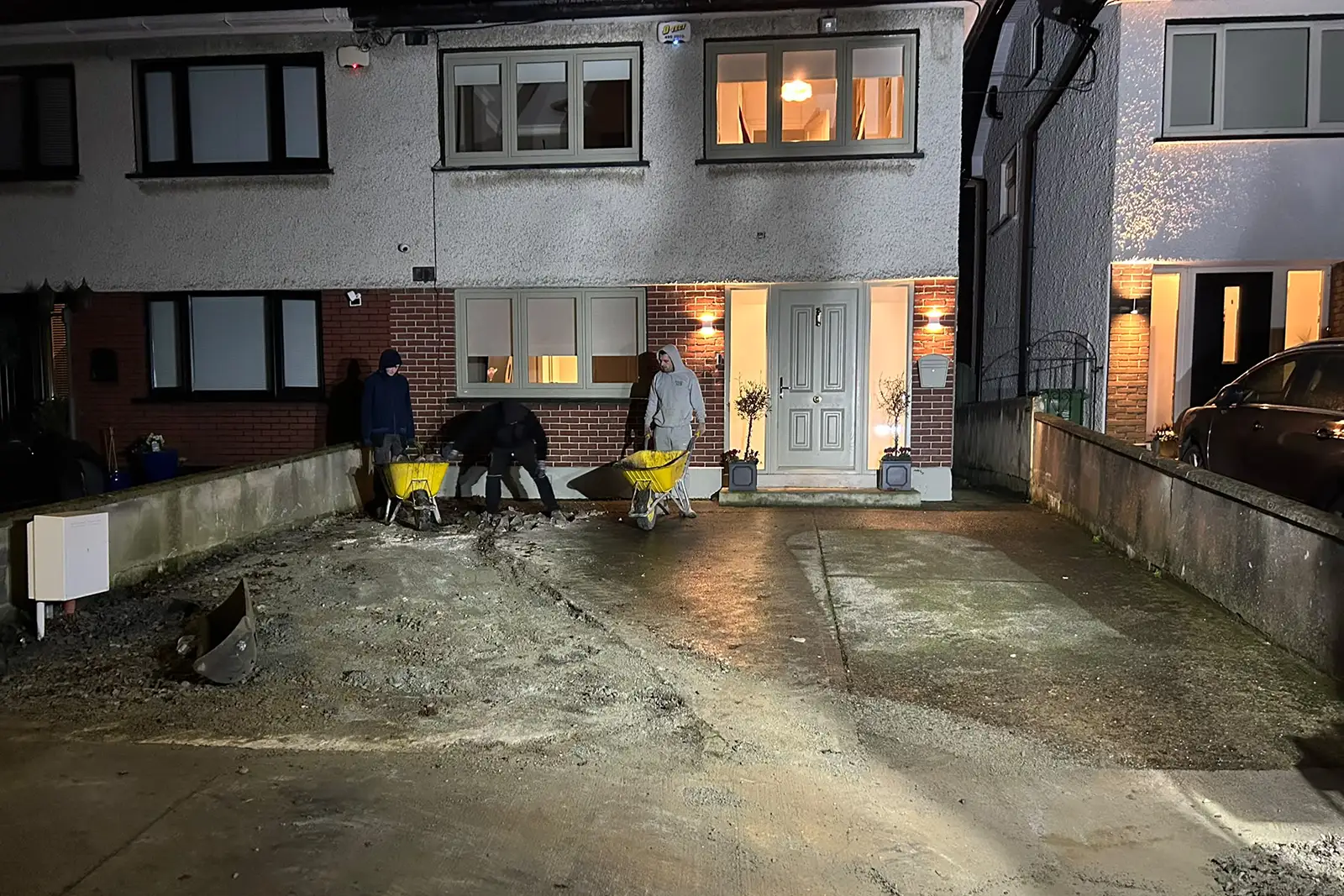 Worn and discoloured concrete driveway at Monalea Grove Firhouse Dublin before replacement