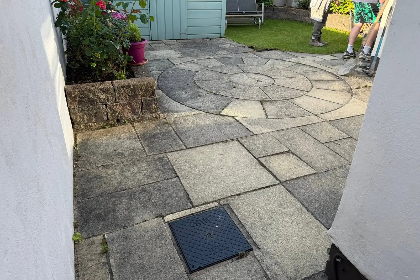 Existing discoloured paved patio before resin patio installation in Stone Abbey Dublin 16