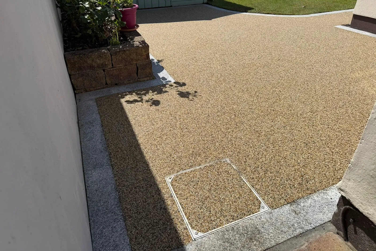 Completed resin patio and pathway with silver granite edging in Stone Abbey Dublin 16