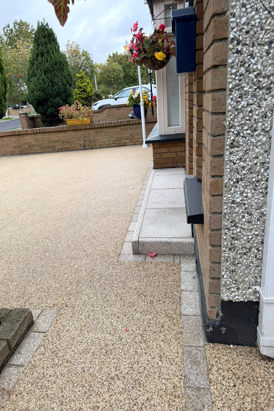Natural granite step installation as part of resin driveway project in Parklands Dublin 24