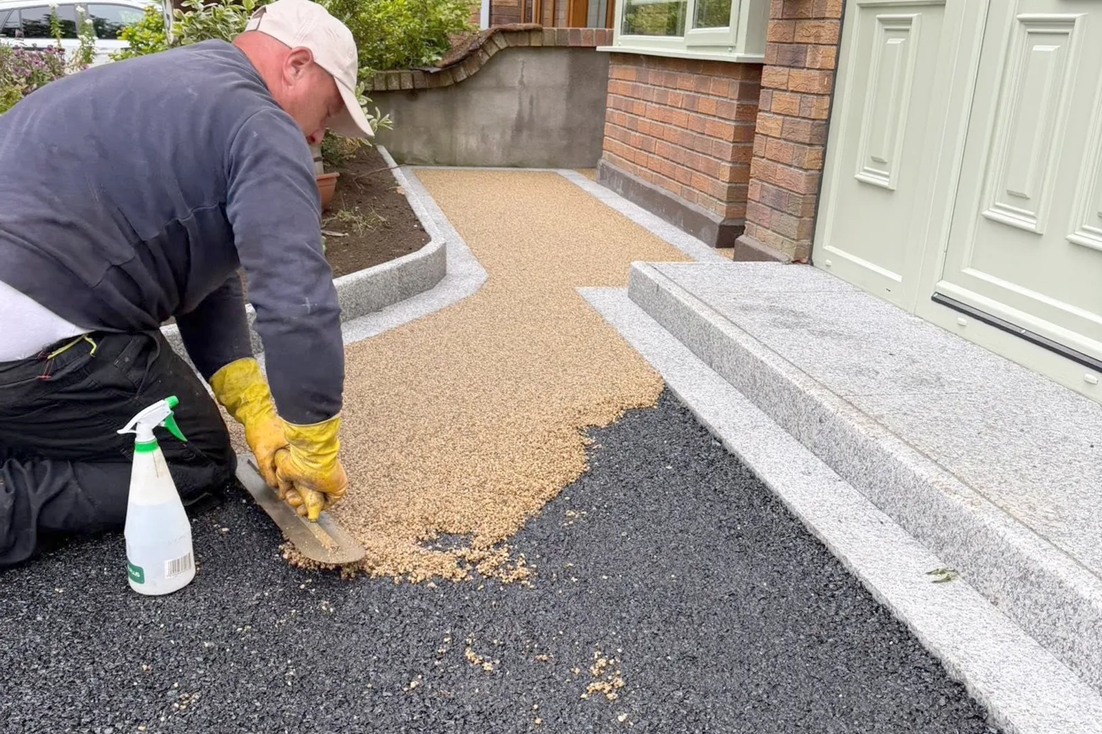 Resin-bound driveway being installed over prepared tarmac base in Templeroan Dublin