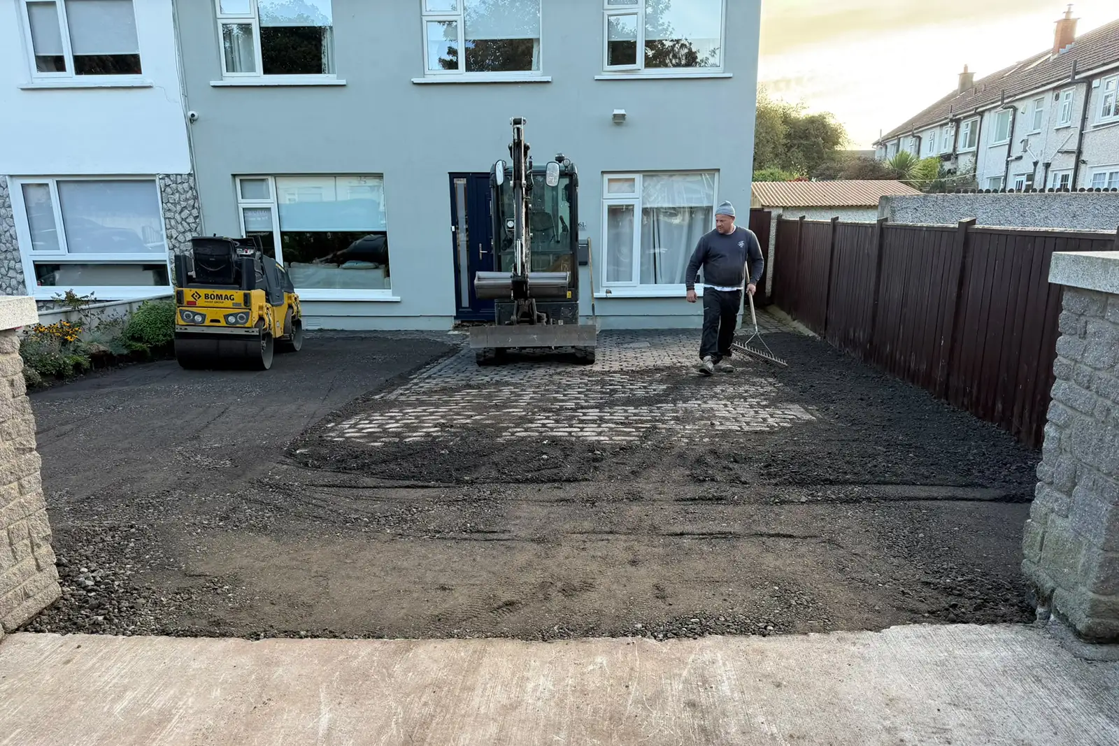 Existing worn cobblelock and tarmac driveway in Balrothery North Dublin before replacement