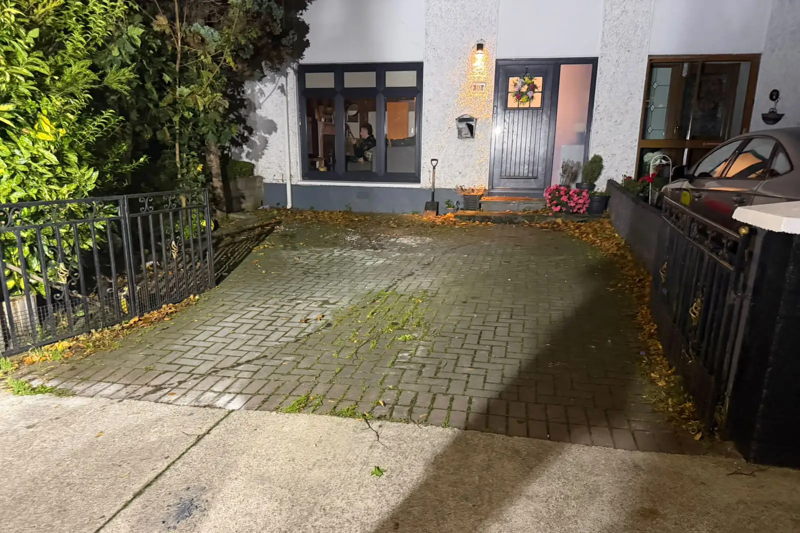 Old uneven cobblelock driveway with weed growth before replacement on Bawnville Road Tallaght