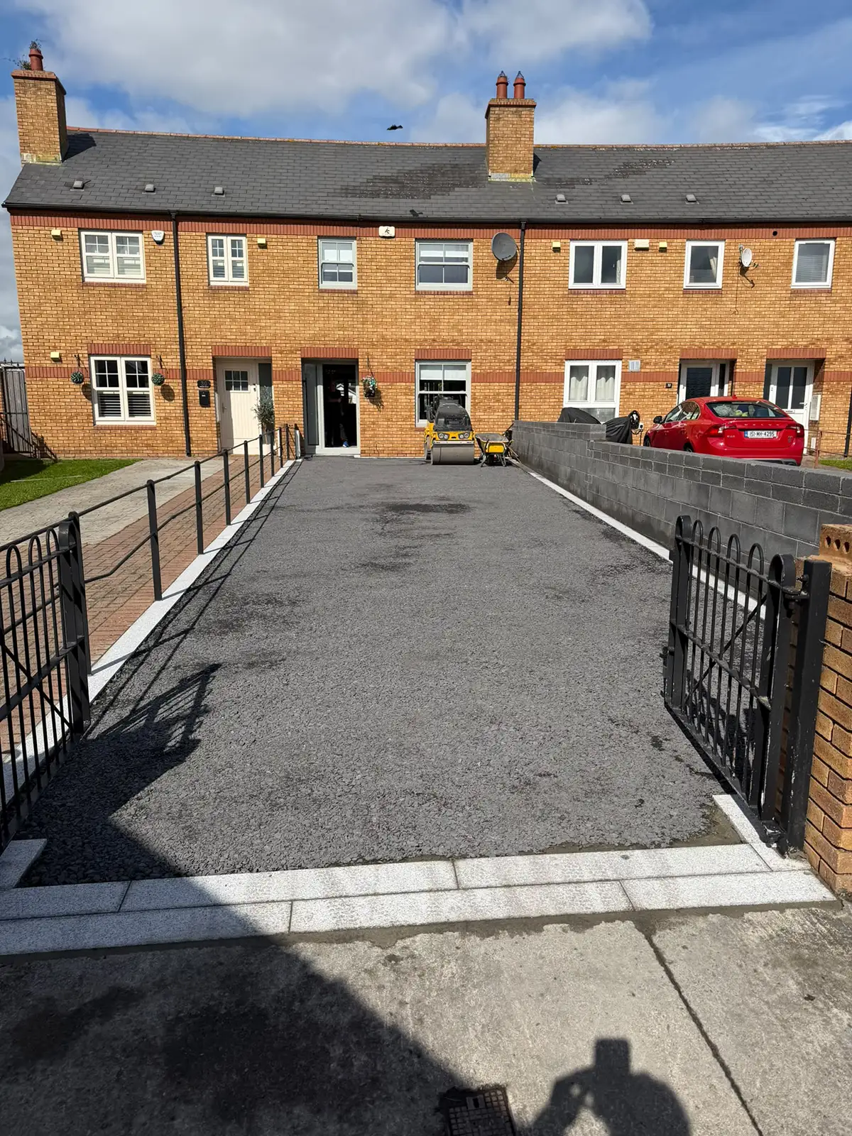 Driveway preparation in Palmerstown Dublin showing the sub-base and silver granite framing before tarmac installation